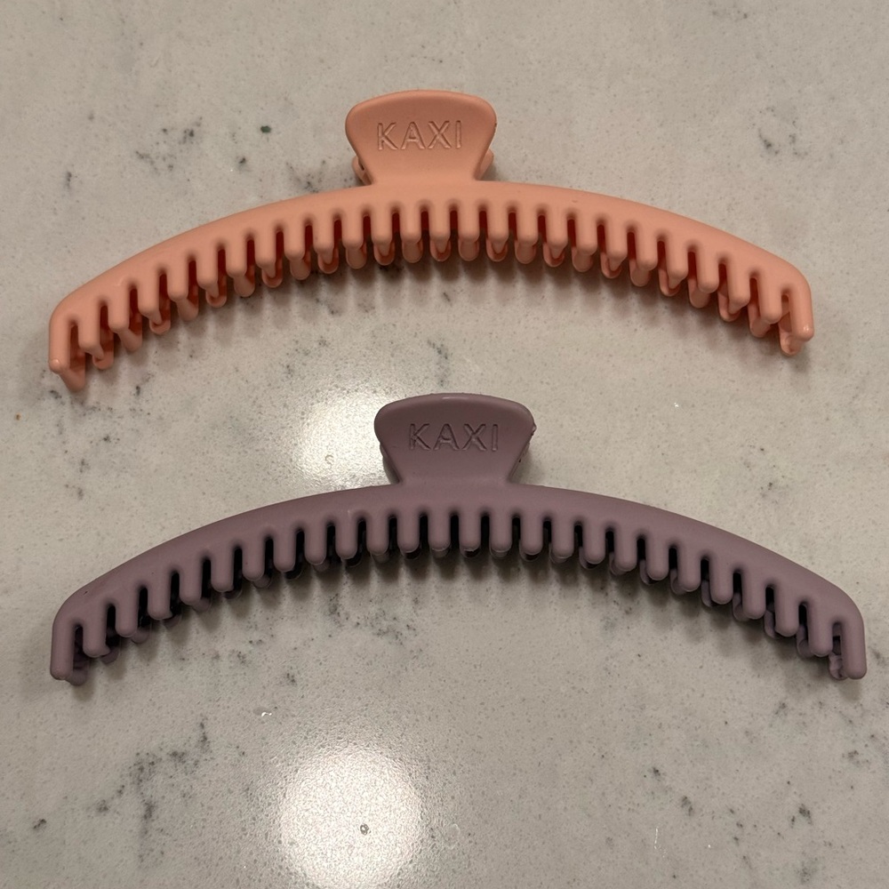 Kaxi Hold Everything hair clips. Brand new but without tags